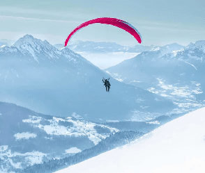 Papier peint photo montagne fly in the Alps bleu - Muralconcept